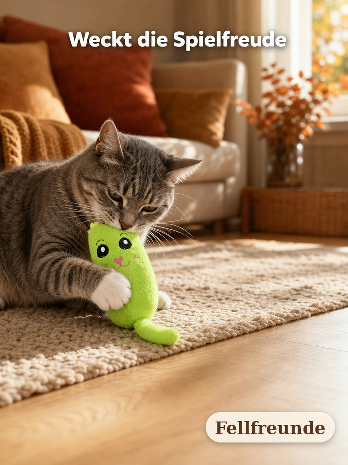 Katze spielt mit dem grünen Katzenminze-Plüschspielzeug auf dem Teppich